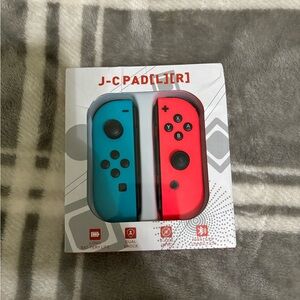 Red and blue Nintendo switch controllers